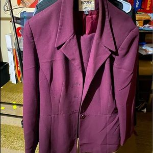 15 ladies suits. Size range from 14, 16, and 18